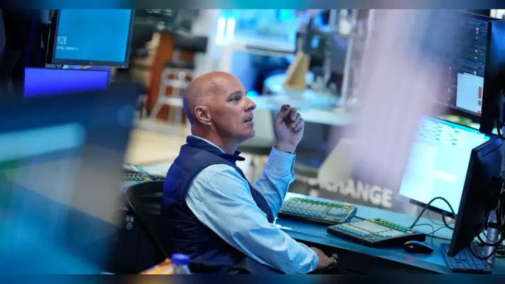 A reprieve from rising oil prices helps US stocks finish the week higher