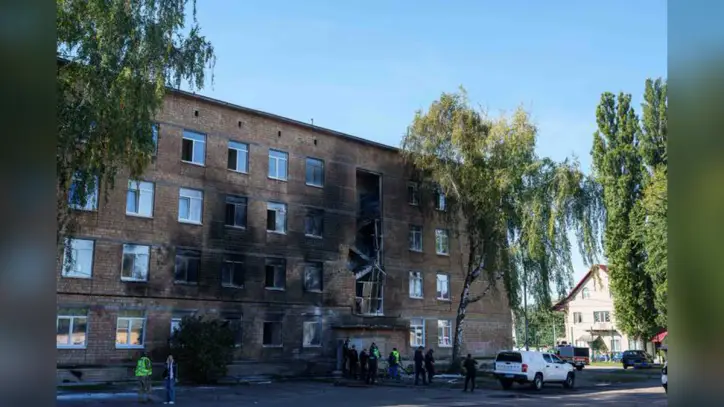 A Russian drone hits a Kyiv school as Moscow presses its aerial campaign against Ukraine