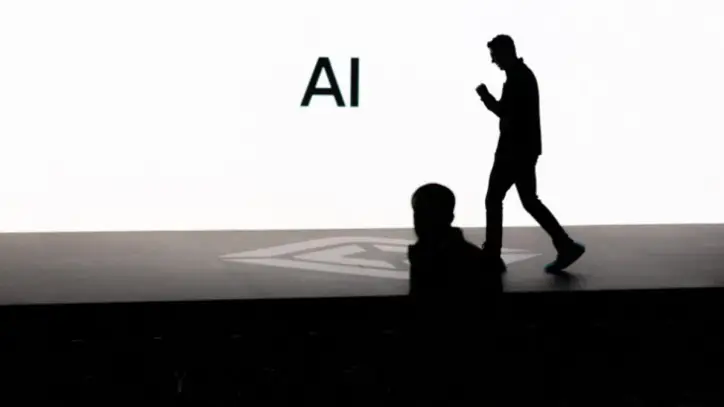 A screen reads 'AI' in reference to artificial intelligence in Palo Alto, California, U.S., December 11, 2025. REUTERS/Carlos Barria