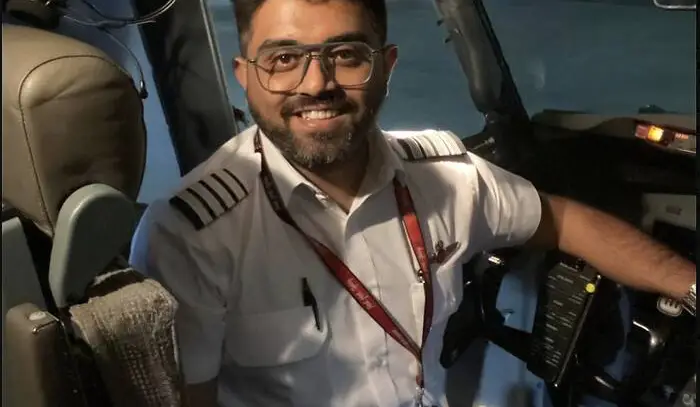 An Indian airline captain is hailed as a hero after a cockpit attack on a FlyDubai flight