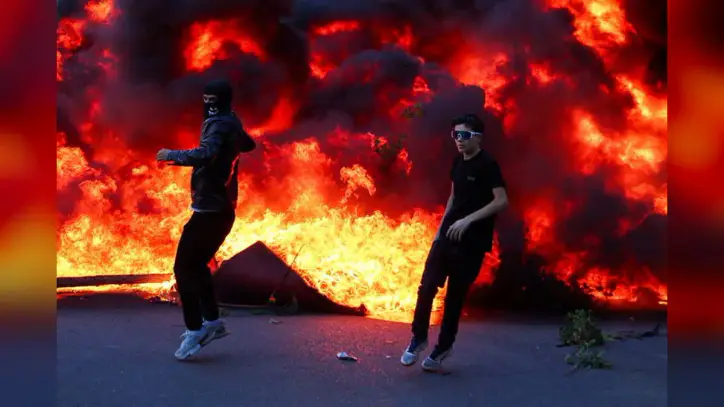 Banks, Buildings Burn as Albania's Capital Tirana Erupts Into Student Violence