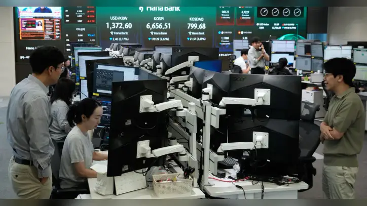 Asian shares decline after stocks slip on Wall Street, while global bond sell-off intensifies