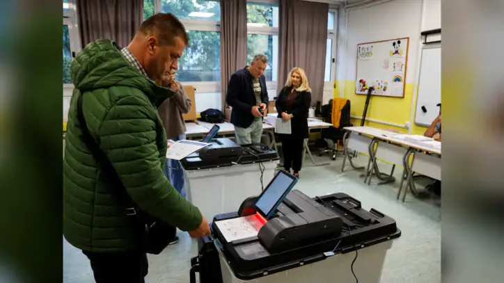 Banned Bosnian Serb leader Dodik declares party victory in election