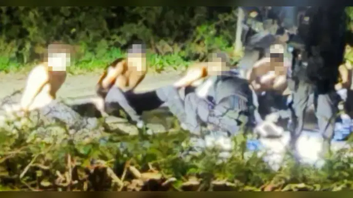 British police find no explosives in vehicles of men detained near base used by U.S.