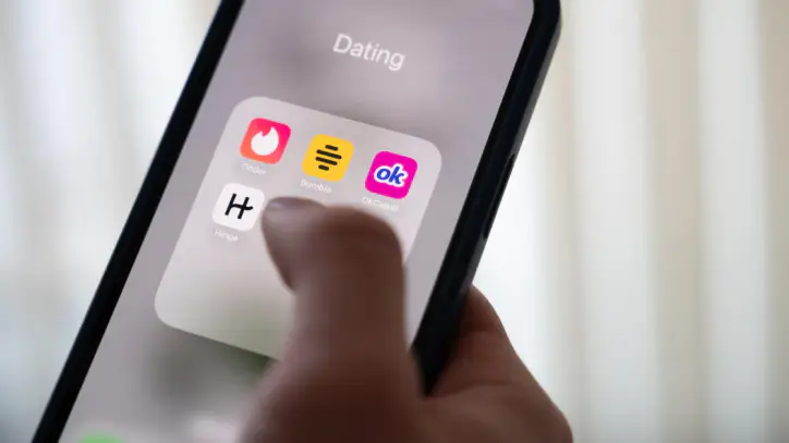 In the cutthroat world of online dating, men use AI to put their best face forward