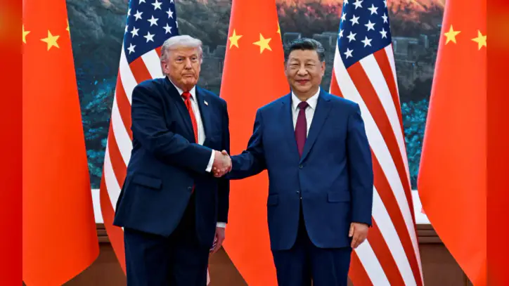 China's Xi kicks off state visit to Washington with a rare planeside welcome from Trump