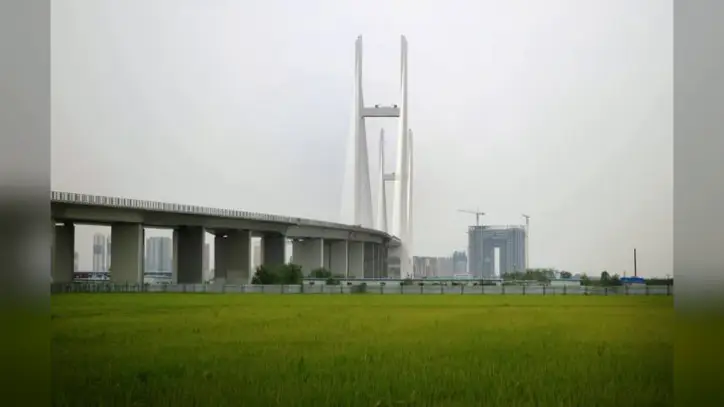 A new bridge linking China and North Korea will open more than a decade late