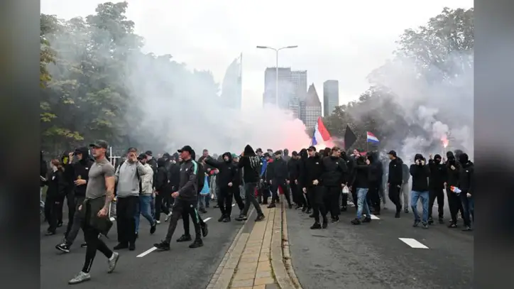 Dutch riot police break up far-right protest in The Hague after violence erupts