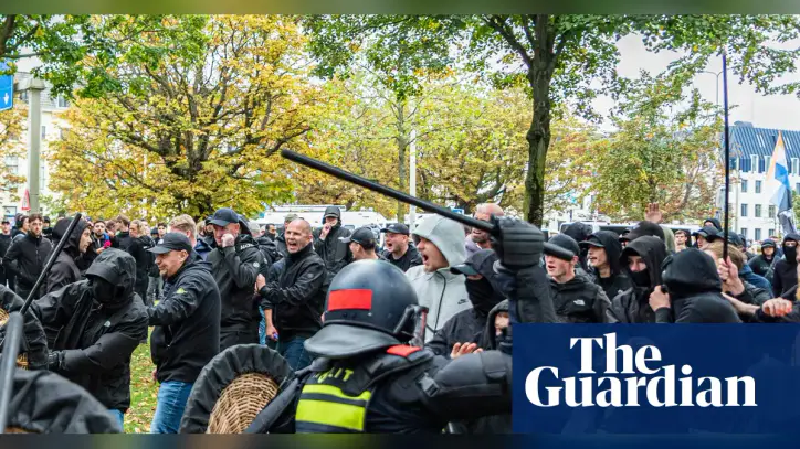 Dutch riot police break up violent far-right protest in The Hague