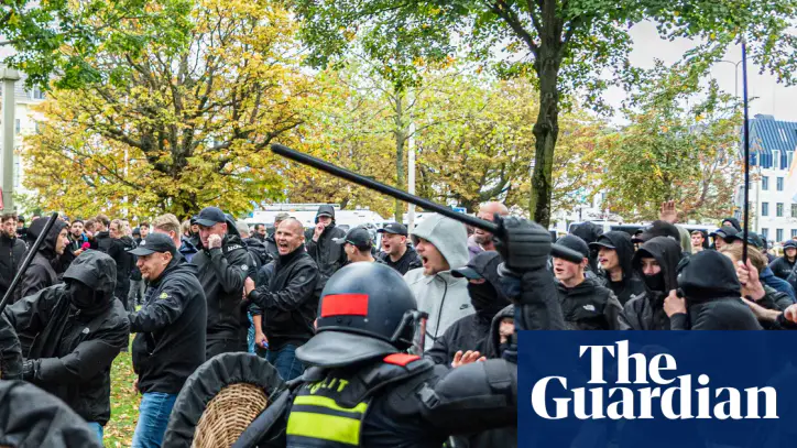 Dutch riot police break up violent far-right protest in The Hague