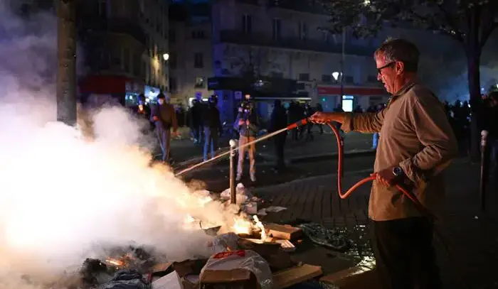 Macron condemns those who 'sought to bring down the Republic' after rioting mars nationwide protests
