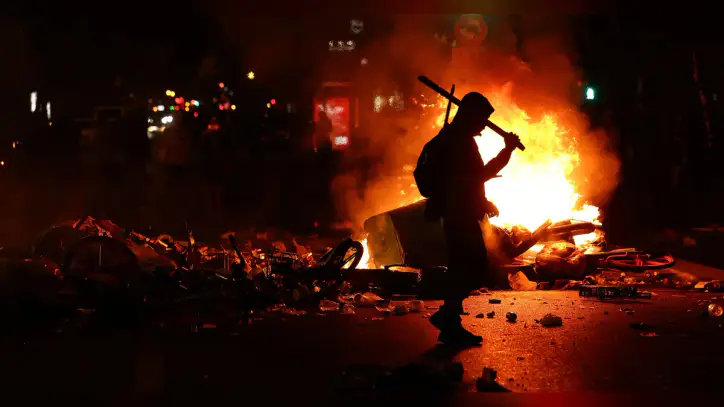 France imposes curfews in parts of Paris, other cities after weekend of riots