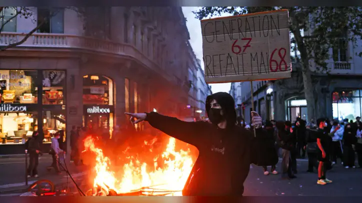 France moves to impose curfews as it reels from worst violence in years