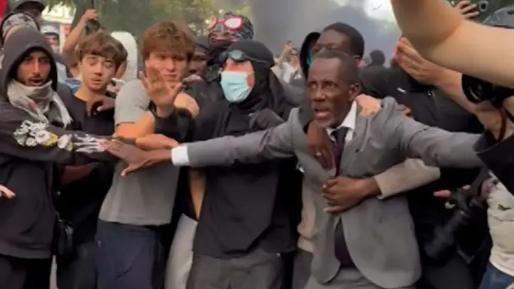 French mayor shields students during protests | CNN