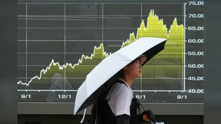 Global shares are mixed as chipmaker shares rally in Tokyo and Seoul
