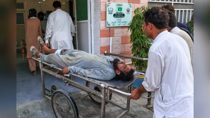 Gunmen target ambulance in Pakistan after suicide bombing at checkpoint killed 12
