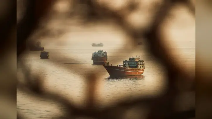 Two Singapore-Registered Vessels Struck in Strait of Hormuz; One Sinks