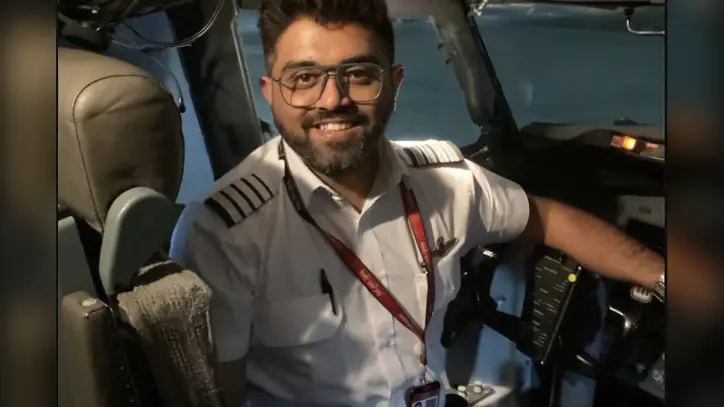An Indian airline captain is hailed as a hero after a cockpit attack on a FlyDubai flight