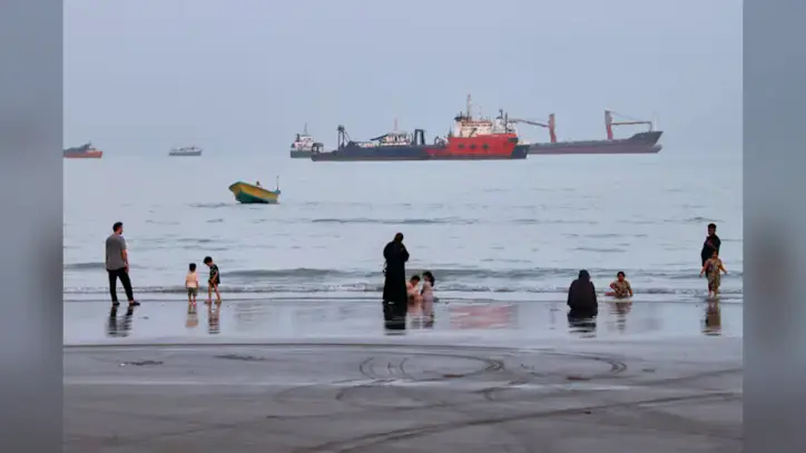 Iran warns of military ship ban in Hormuz under potential deal with Oman, and other Middle East news