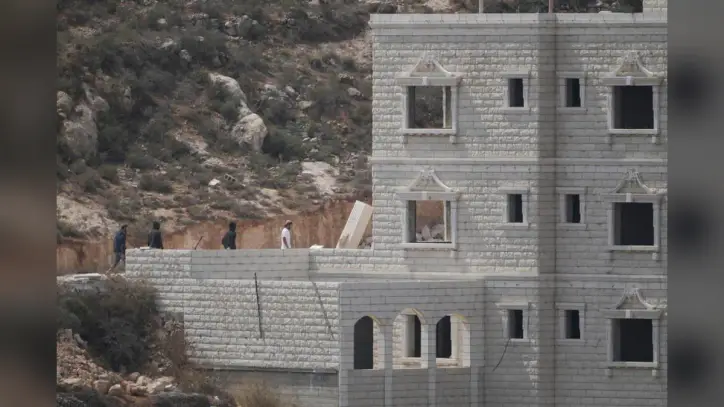Iran's Leader Calls for Muslim Unity, NBC Crew Attacked in West Bank and Other Mideast News