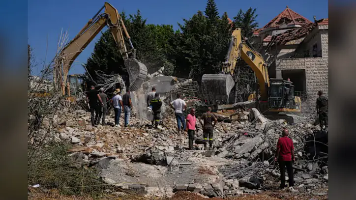 Israeli airstrikes hit a Lebanese village, killing 9, and other Mideast developments