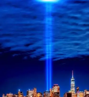 Two beams of light represent the former Twin Towers of the World Trade Center during the 2004 memorial of the September 11, 2001 attacks. They look like hopeful searchlights for an alien visitation that might bring peace to Earth. (Image credit: Wikimedia)