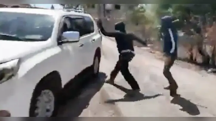 Palestinian woman and NBC News team attacked by masked Israeli settlers in West Bank