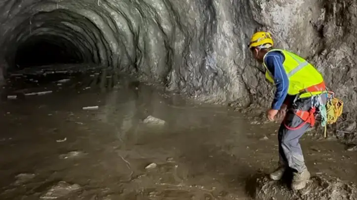 Nepal floods LIVE: A rescuer works at the entrance of a tunnel at Chilime Hydropower Plant as rescue operations continue for people trapped inside following deadly flash floods and a mudslide, in Rasuwa, Nepal.