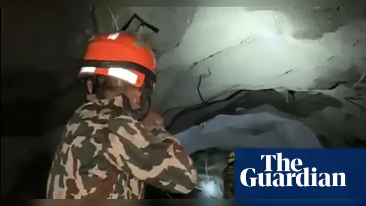 Nepal rescuers race to reach hundreds feared trapped in hydropower tunnels