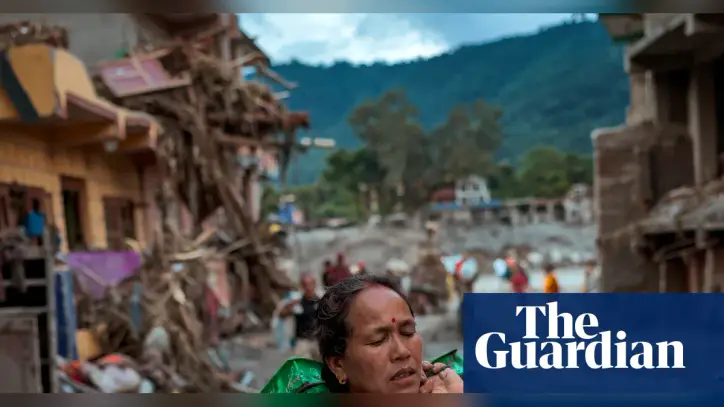 Nepal-Tibet deaths from flash flooding rise amid race to free workers in tunnel