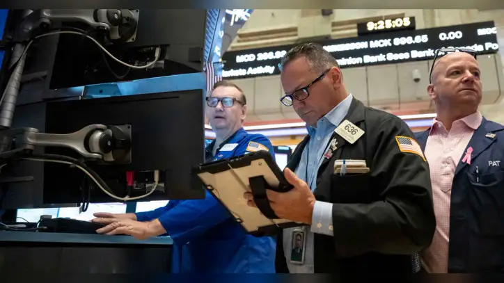 Oil prices fall to $104 and world shares are mixed following Wall Street losses