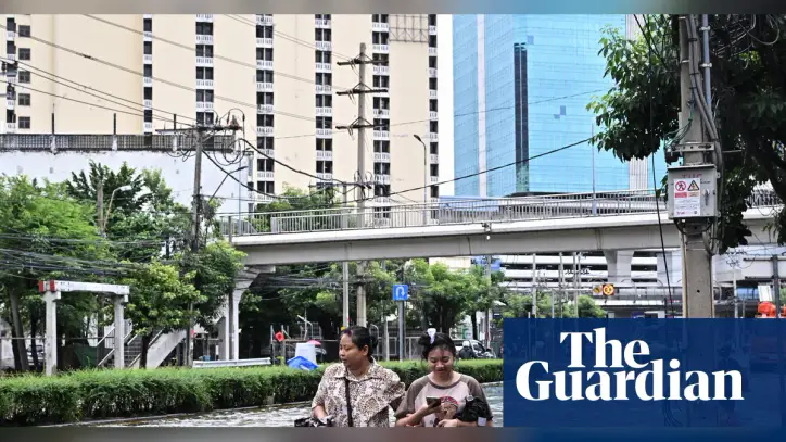 ‘Our house was under water’: Bangkok floods force thousands into shelters as disaster declared