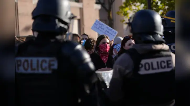 Police fire tear gas at barricaded Paris high school as student protests show no sign of ending
