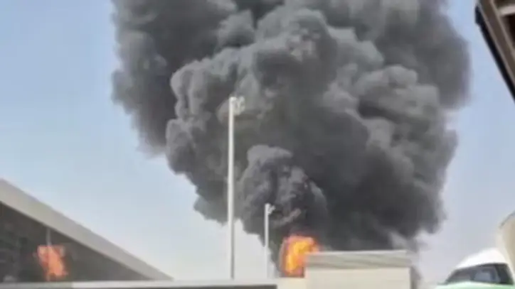 Smoke and flames rise from King Khalid Airport, after Yemen’s Iran-backed Houthis said they attacked the airport, in Riyadh, Saudi Arabia. (Social Media via REUTERS)