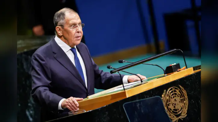 Russia's top diplomat rejects German calls to ease off its 'dangerous' escalation toward the country