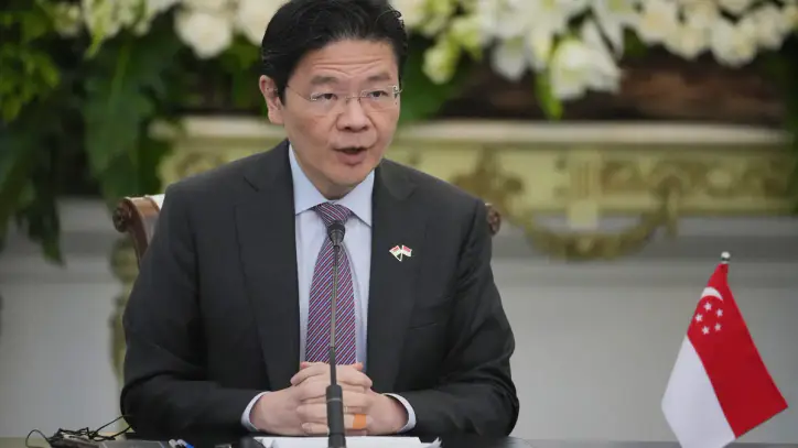 Singapore ministers, among global highest paid officials, get first raise in 15 years