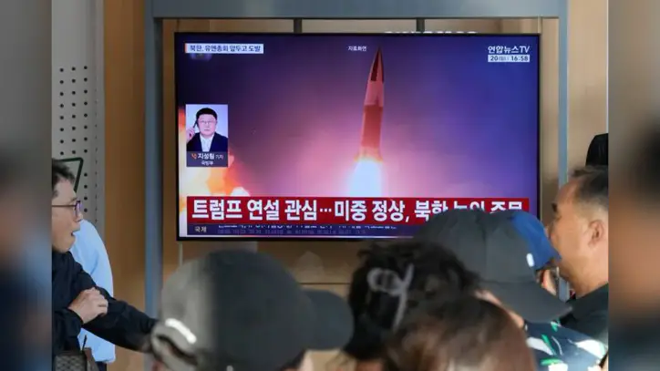 South Korea says North Korea launched a ballistic missile and another projectile toward the sea