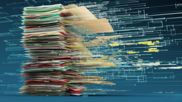 A stack of file folders and paper with digitization as being turned to AI