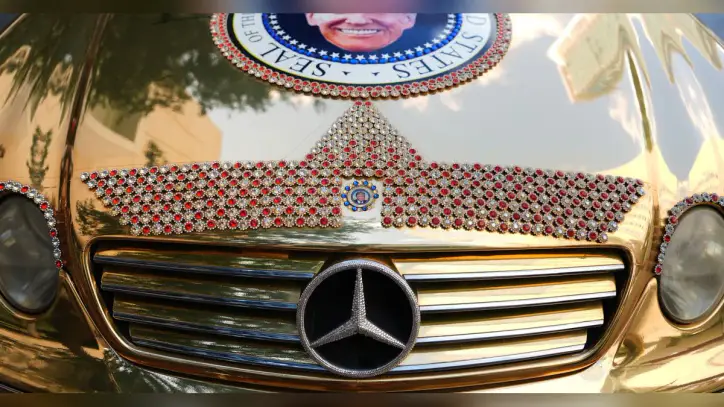 The Latest: Trump gave $45,000 cash to Natalie Harp amid gifts to White House aides