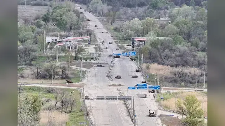Desperate civilians risk their lives along mined roads to escape from a Russian-held city