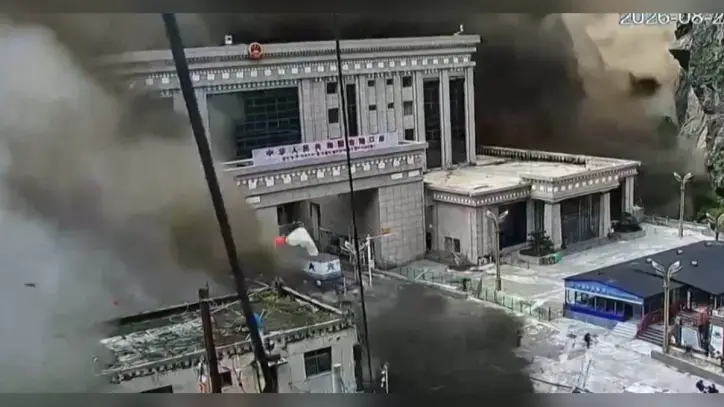 Videos show crushing walls of water overtake buildings and bridges on Nepal-Tibet border