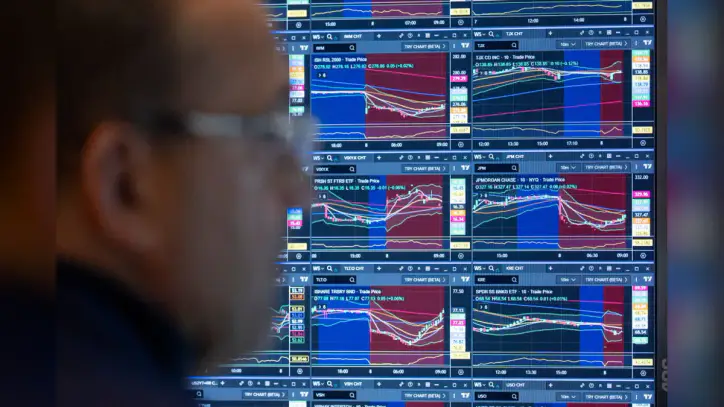 Wall Street finishes its record-setting week with gains