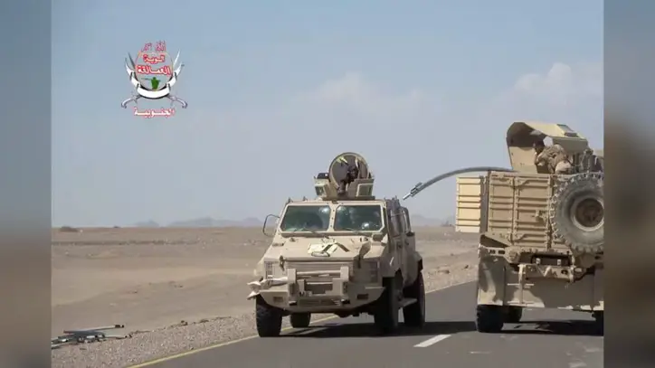 Yemeni Government Fighters Shown Driving Vehicles Over Houthi Opponents